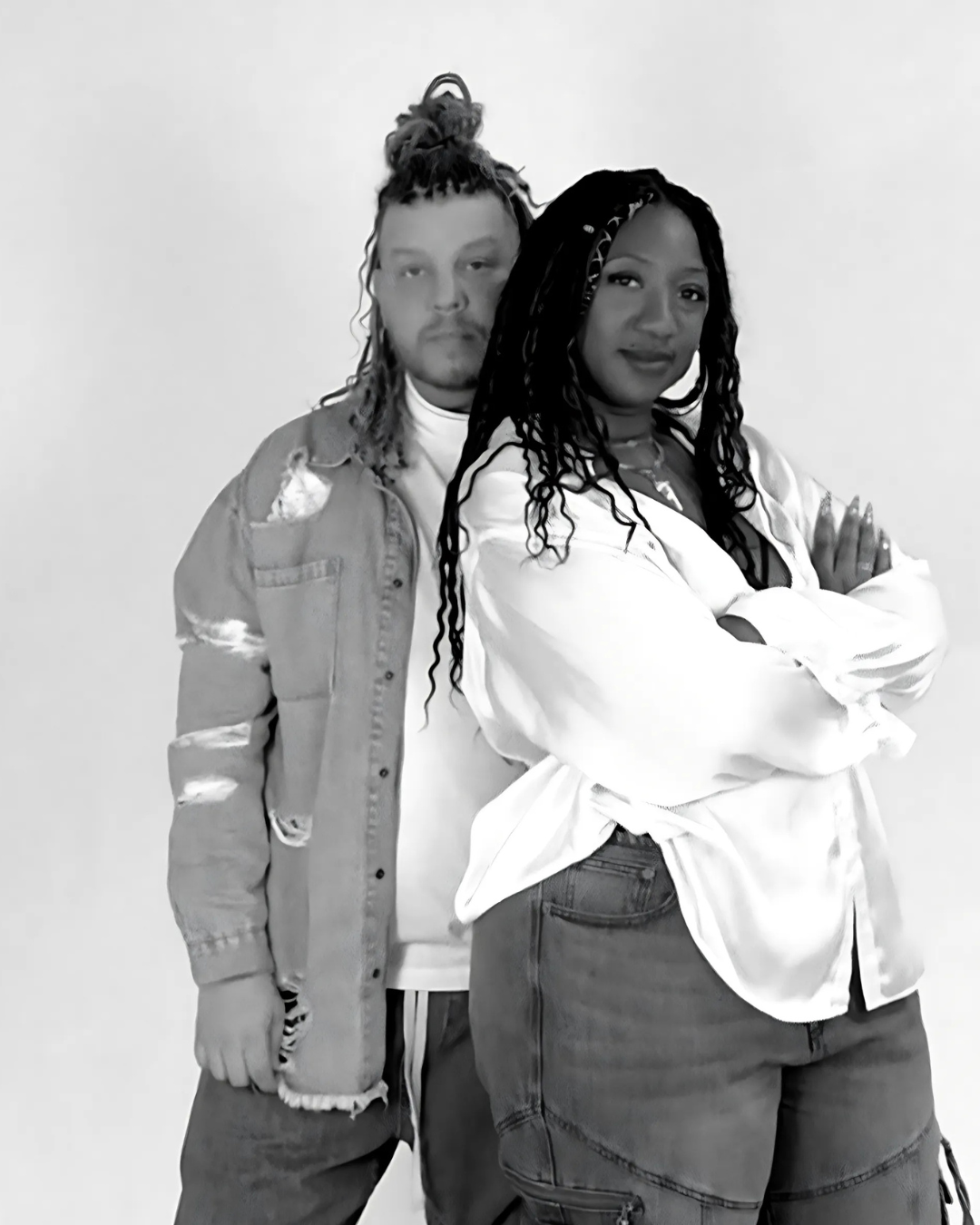 Villa Aburi Founders, Stacey and Yadder, standing close together against a plain background