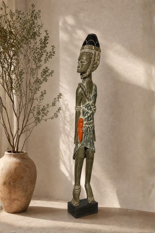 African warrior sculpture by Tekura, depicting a male figure with traditional attire and detailed craftsmanship.