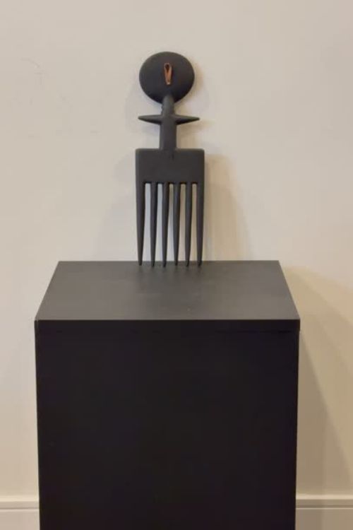 Tekura Akuaba comb wall hanging sculpture featuring traditional Ghanaian design and craftsmanship.