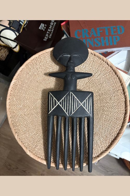 Akuaba-inspired wall hanging and straw plate from September Collective's The Curator's Edit holiday gift set.