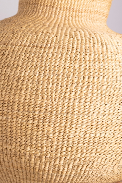 Close-up of Baba Tree Jemima 10 Cows Art Basket in Natural Dune with detailed woven cow design.
