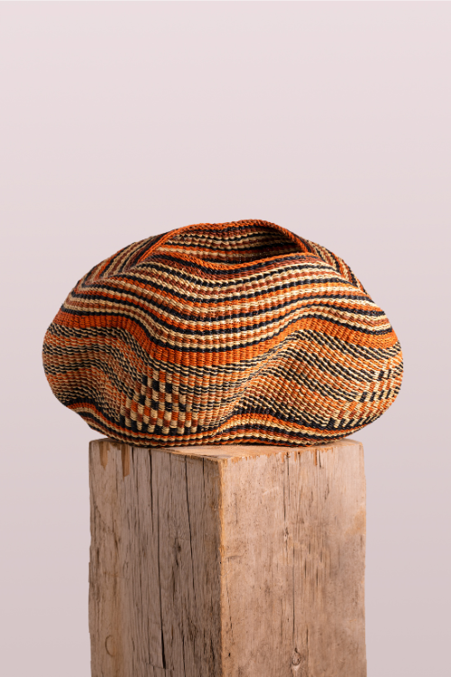 Baba Tree Pebble Art Basket in natural, orange, brown, and black tones, showcasing handcrafted art basket with pebble designs.