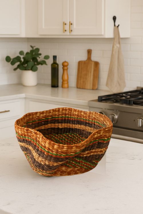 Petite Pakurigo Wave Basket - Golden Coast on a kitchen counter with cabinets and appliances in the background