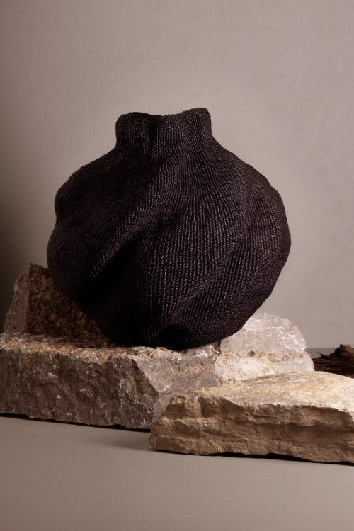 Black Yoomelingah Yure artisan art basket by Baba Tree, showcasing minimalist noir design with intricate woven details.