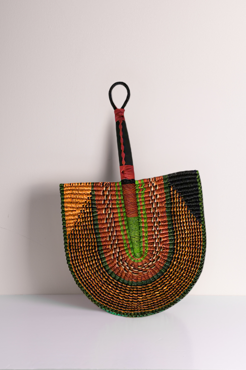 The Handcrafted Bolga Decorative Fan - Kente Geometric Design - Handwoven Elegance from Ghana is a cost-conscious way to bring authentic African craftsmanship into your home.