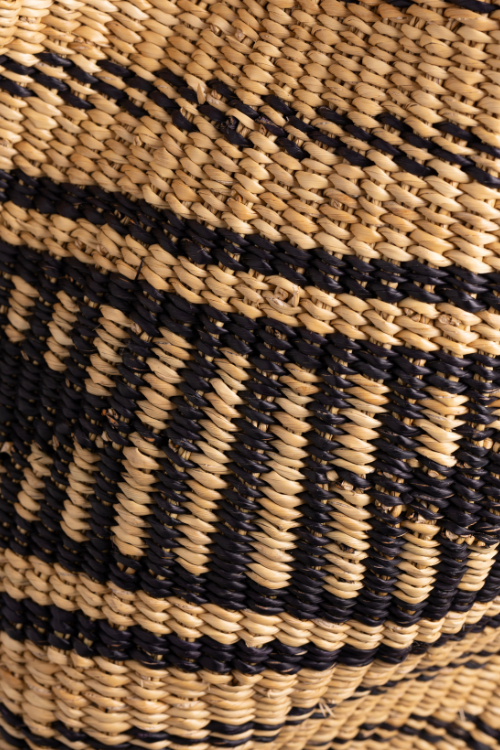 Close-up of Baba Tree Pakurigo Wave Basket in ebony triangle design, showcasing woven storage basket texture.