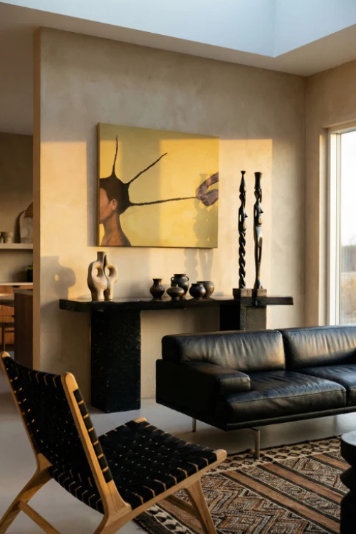 Interwoven Grace black canvas art by Rhen Ovation displayed on a stylish wall in a modern living room setting.