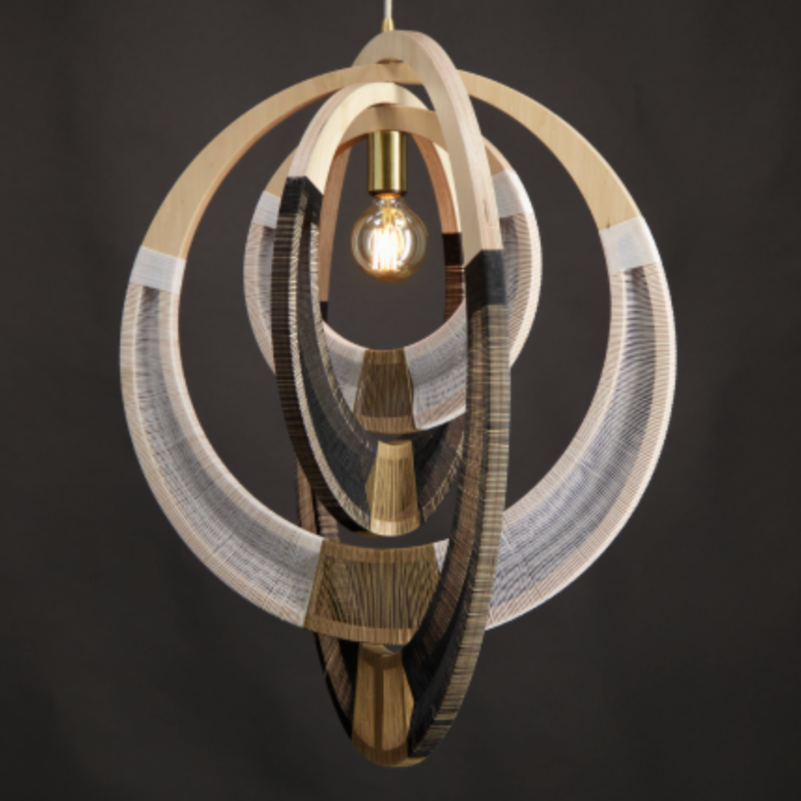 Modern Gesture pendant light with wooden design on a dark background
