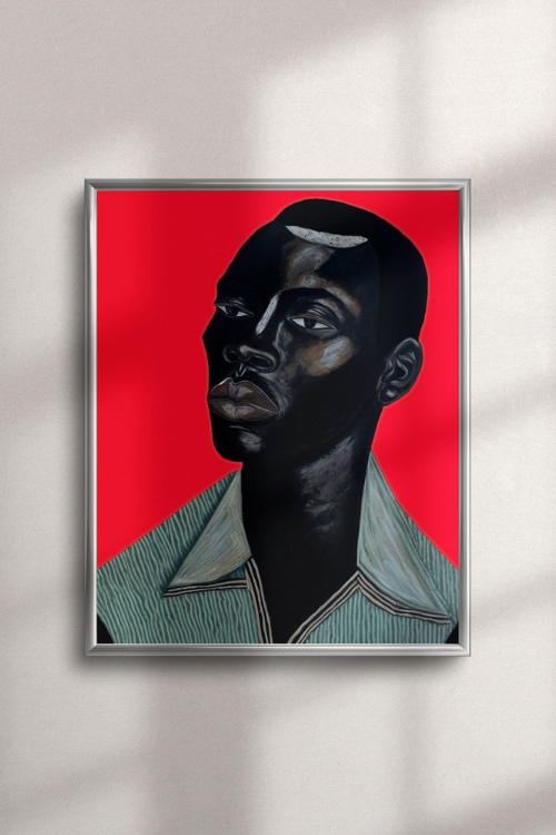 "Remy" Fine Art Printt of a Black man with deep brown skin, thoughtful eyes, and a mint green collared shirt against a bold red background. Modern Black portrait wall art symbolizing strength, sensitivity, and identity.