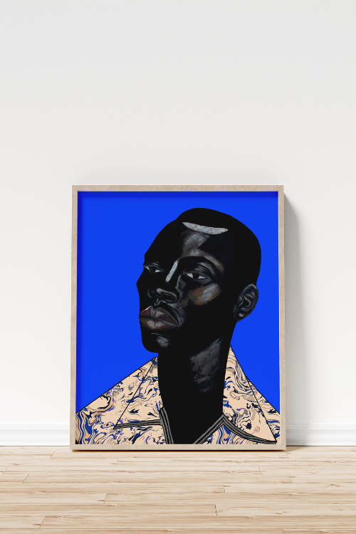 "Remy II" Fine Art Print features a Black man with intense, thoughtful eyes set against a vibrant sapphire Blue background. Remy's deep ebony skin is beautifully accentuated with subtle highlights, creating a sense of depth and dimension. His Blue geometric patterned collared shirt adds a soft contrast to the bold palette, embodying both strength and sensitivity.