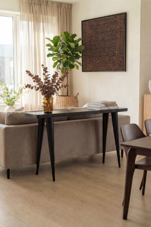 Black Tekura walking console with sleek design, featuring a modern console table for stylish home decor.
