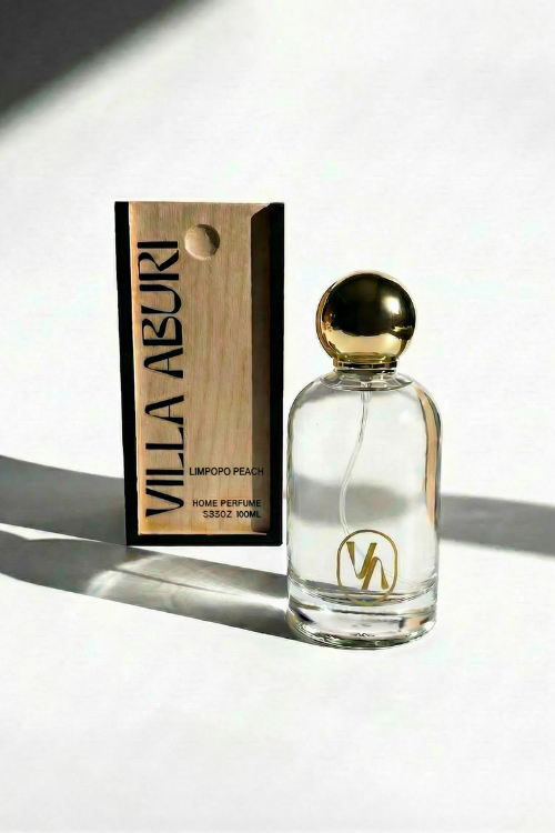 Villa Aburi Limpopo Peach luxury room spray bottle with wooden box, showcasing elegant packaging and vibrant product design.