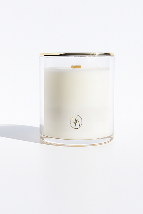 Villa Aburi Ganja Suede Scented Candle 11 0Z/325ML(3.75”W x 4.25”H) in a glass jar with a gold lid on a white background