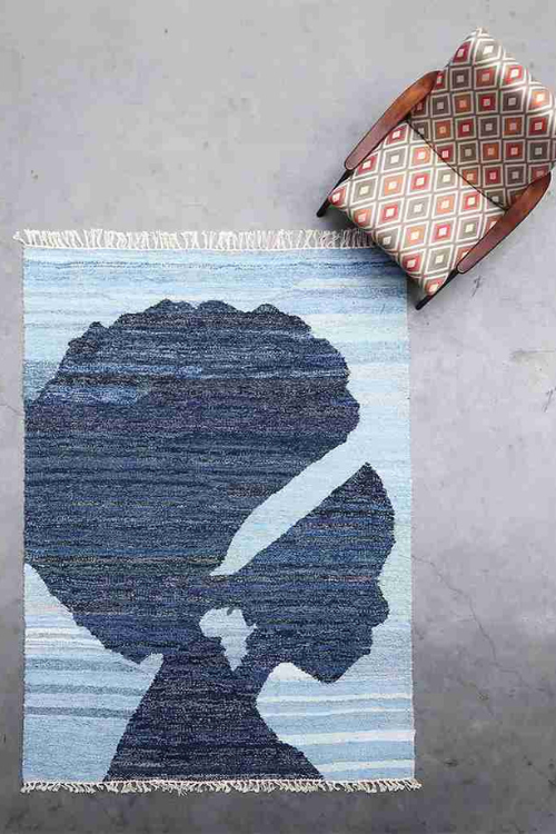 Handwoven African Queen wall textile made from 100% recycled denim by Africa Collect Textile, featuring vibrant African-inspired design.
