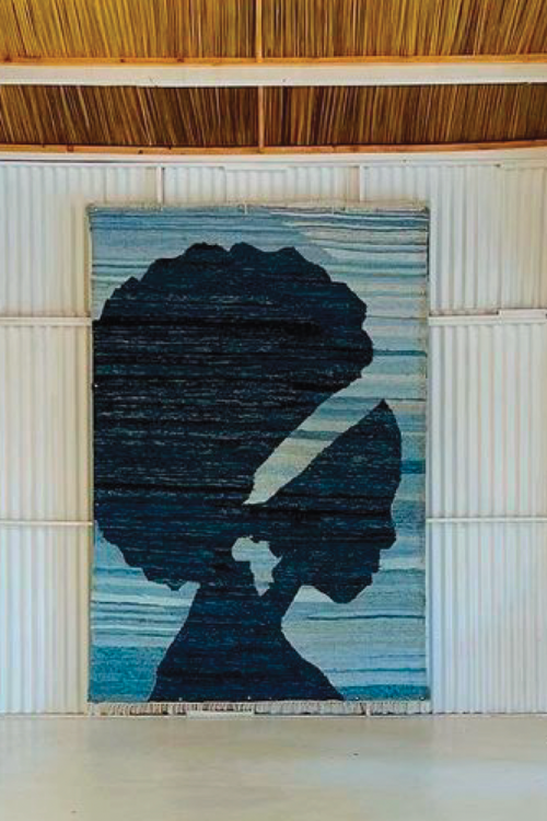 Handwoven African Queen wall textile made from recycled denim by Africa Collect Textile, featuring intricate traditional African patterns.
