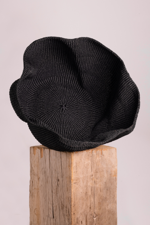 Black Pakurigo Wave Basket by Baba Tree, minimalist storage basket with a curved wave design, perfect for stylish organization.