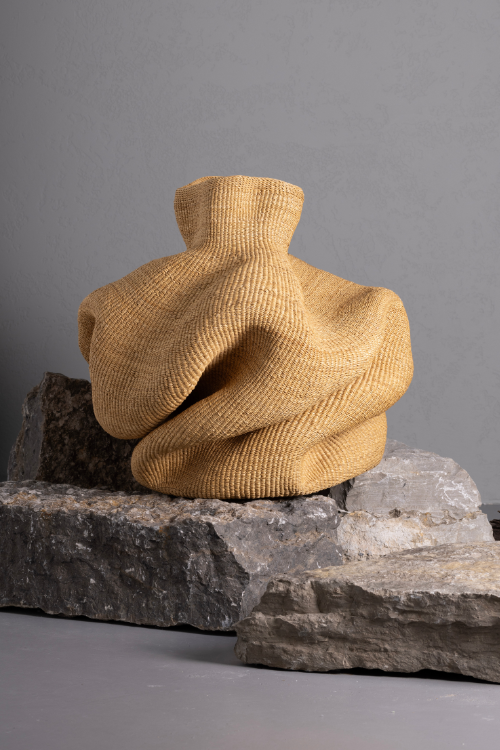 Natural Yoomelingah Yure artisan basket by Baba Tree, handcrafted art basket in natural Dune color, woven with intricate details.