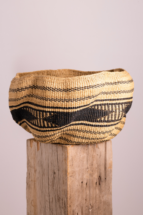 Baba Tree Pakurigo Wave Basket in ebony triangle design, natural black storage basket with woven texture and modern geometric pattern.