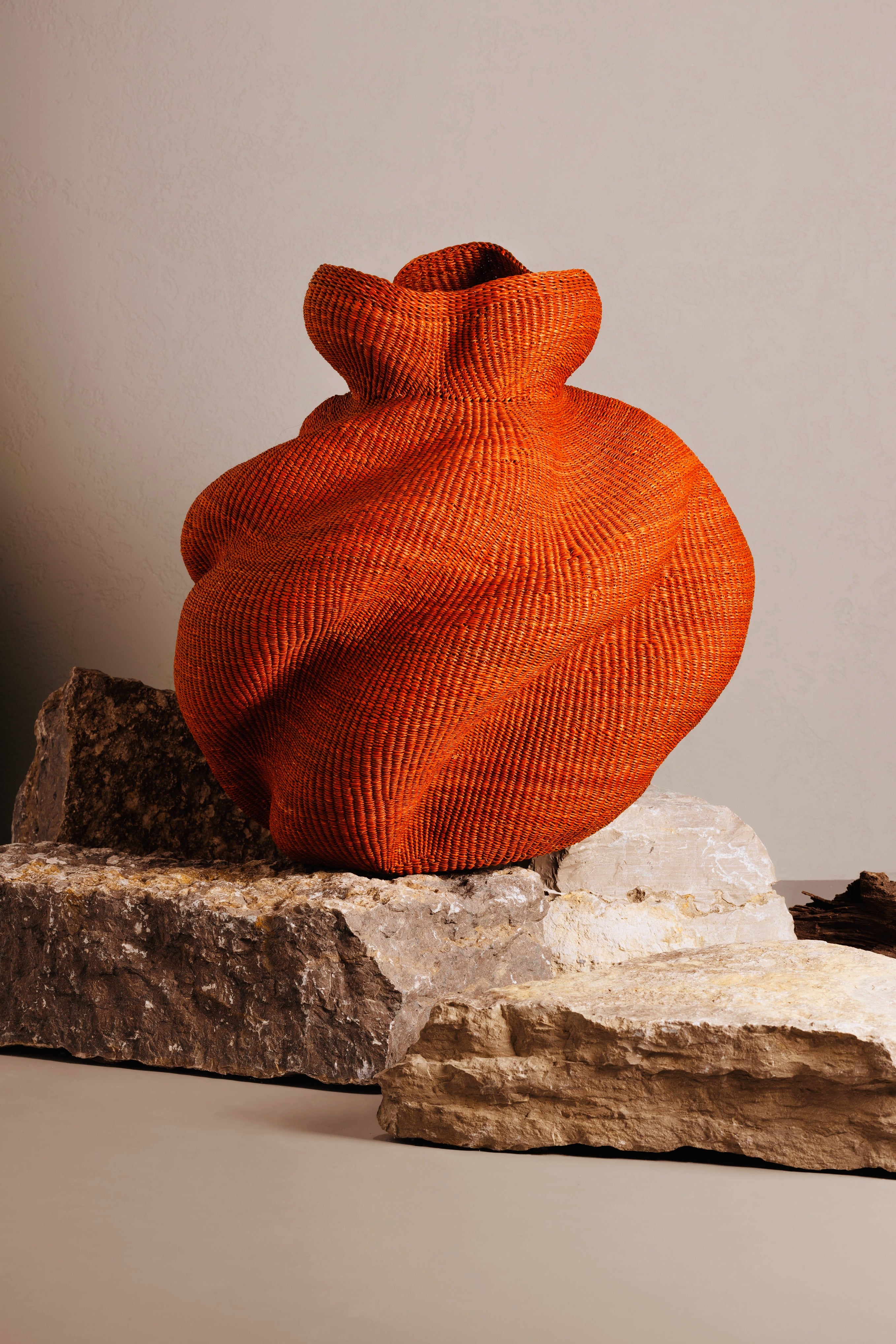 Yoomelingah Yure artisan basket in sienna color by Baba Tree, handcrafted woven art basket with intricate design and natural fibers.