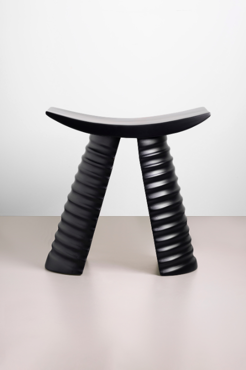 Tekura Labadi Black Ring Stool with wooden seat and metal frame, modern African-inspired design, perfect for home or office decor.