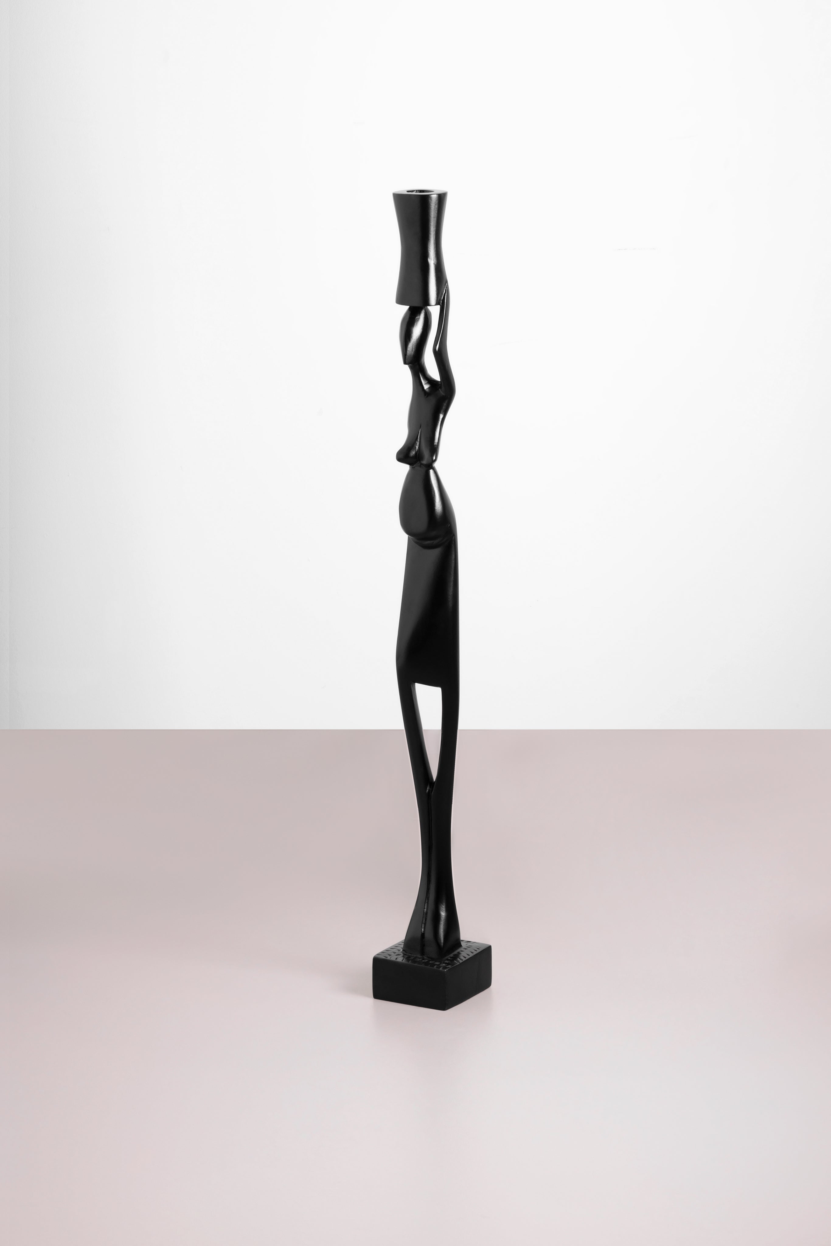 Woman Carrying Pot Sculpture