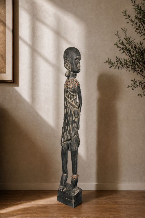 African female warrior sculpture by Tekura, detailed metal sculpture showcasing traditional warrior attire and fierce stance.