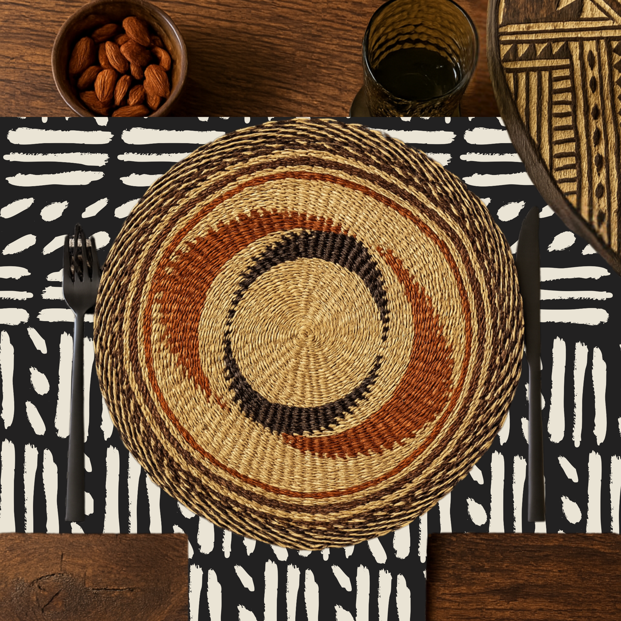 Baba Tree Placemats - Black Star Swirl. Hand woven Baba Tree placemat in natural, brown, and black.