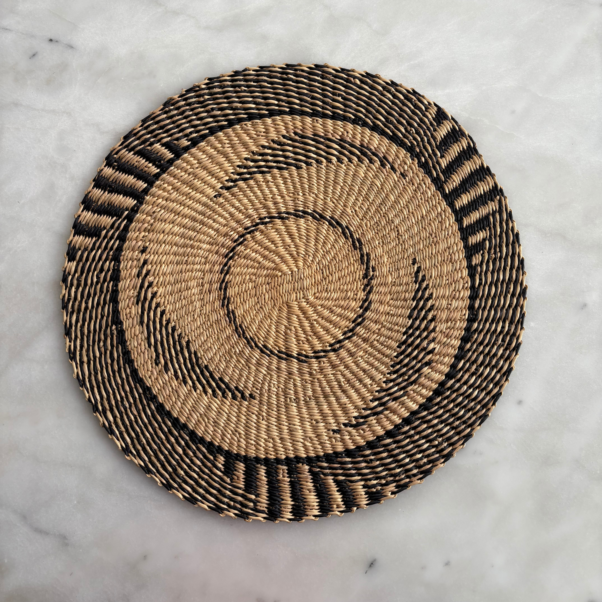 Baba Tree Placemats - Coastal Currents in Black and Natural circular triangle design