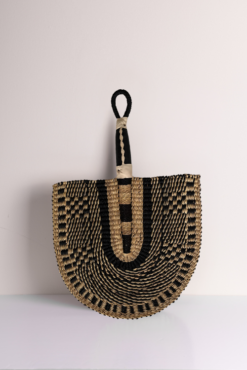 Handcrafted Bolga Decorative Fan – Black & Natural Essence - Handwoven Elegance from Ghana is a cost-conscious way to bring authentic African craftsmanship into your home.