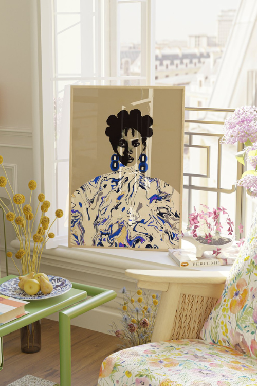 "Makara" Fine Art Print Black Portrait in 16x20. This statement piece features a confident Black woman with sculptural bantu knots, adorned with geometric cobalt blue earrings against a mesmerizing blue marble pattern.