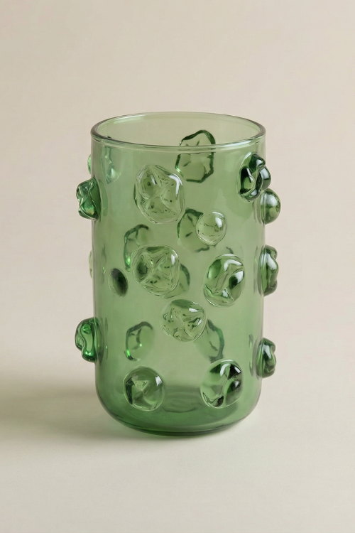 Nywele vase in moss colour designed by September Collective x Kitengela Glass, featuring a clear glass vessel with textured moss accents.
