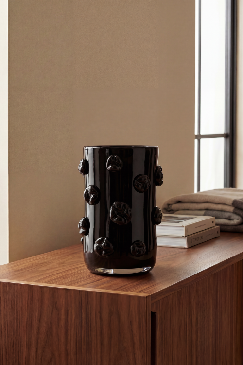 Glass sculpture Nywele Vase Onyx by September Collective x Kitengela Glass featuring smooth, polished black onyx-inspired glass with elegant, organic shapes