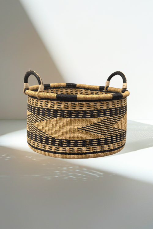 baba-tree-Woven-Basket-Half-Tub-Medium-Ebony-Triangle-laundry-September-Collective with black and natural pattern on a white surface