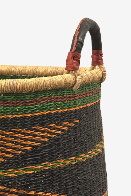 Medium Kente woven basket half tub with handles, used for storage, by Baba Tree. Close-up view showing detailed weaving and sturdy handles.