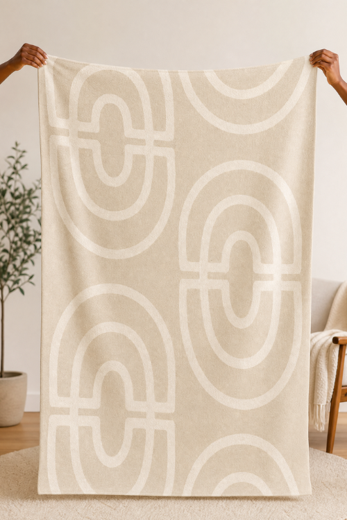Villa Aburi Krado Knit Throw blanket in cozy knit texture, displayed in natural light on a neutral background.