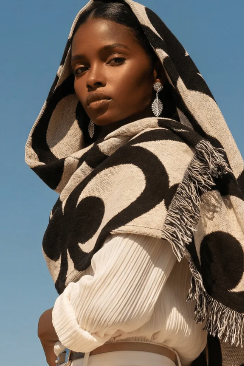 Villa Aburi Mate Masie woven throw in black and white, made from 100% organic cotton, featuring intricate woven patterns.